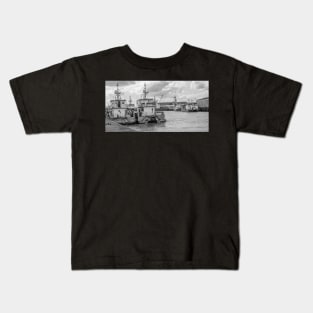 Crew transfer vessels moored up in the docks in the seaside town of Great Yarmouth, Norfolk Kids T-Shirt